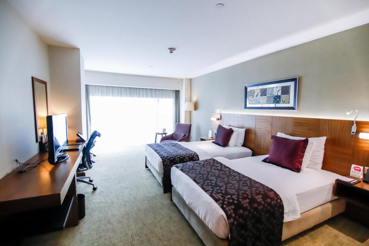 Hotel Crowne Plaza Istanbul Harbiye By Ihg Extérieur photo A room at the hotel